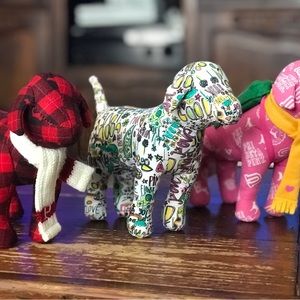 3 VS Pink dogs. Stand approximately 5-6” and are about 7-8” long.